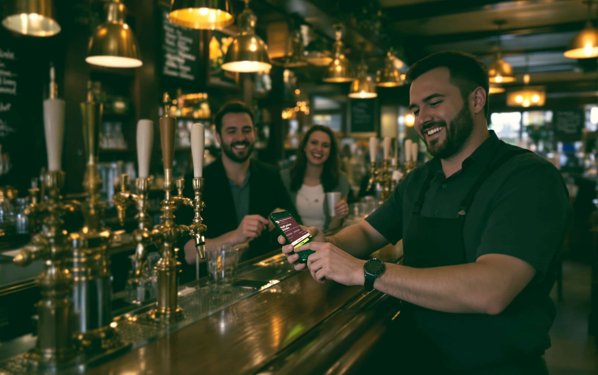 A bartender checking a member's Regz card on a phone at the bar