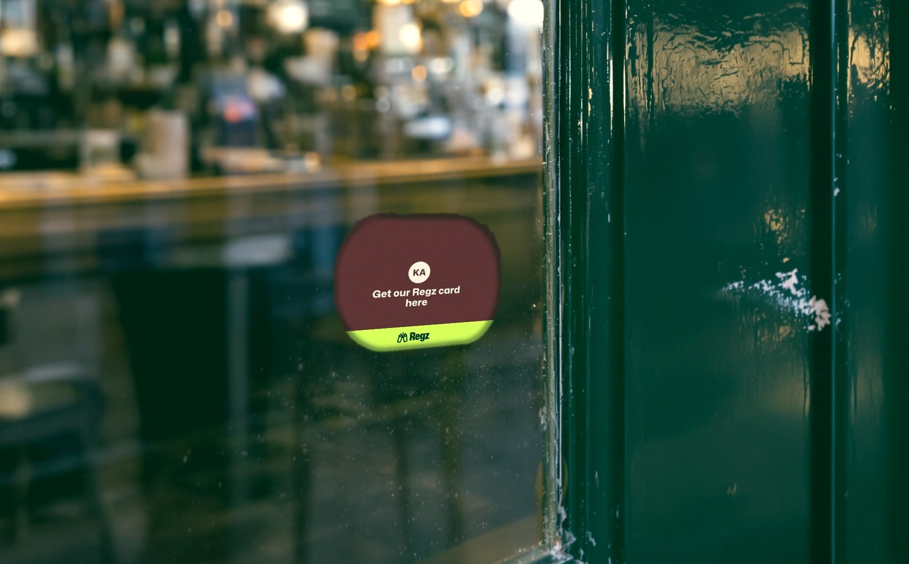 A window sticker saying get our Regz card here